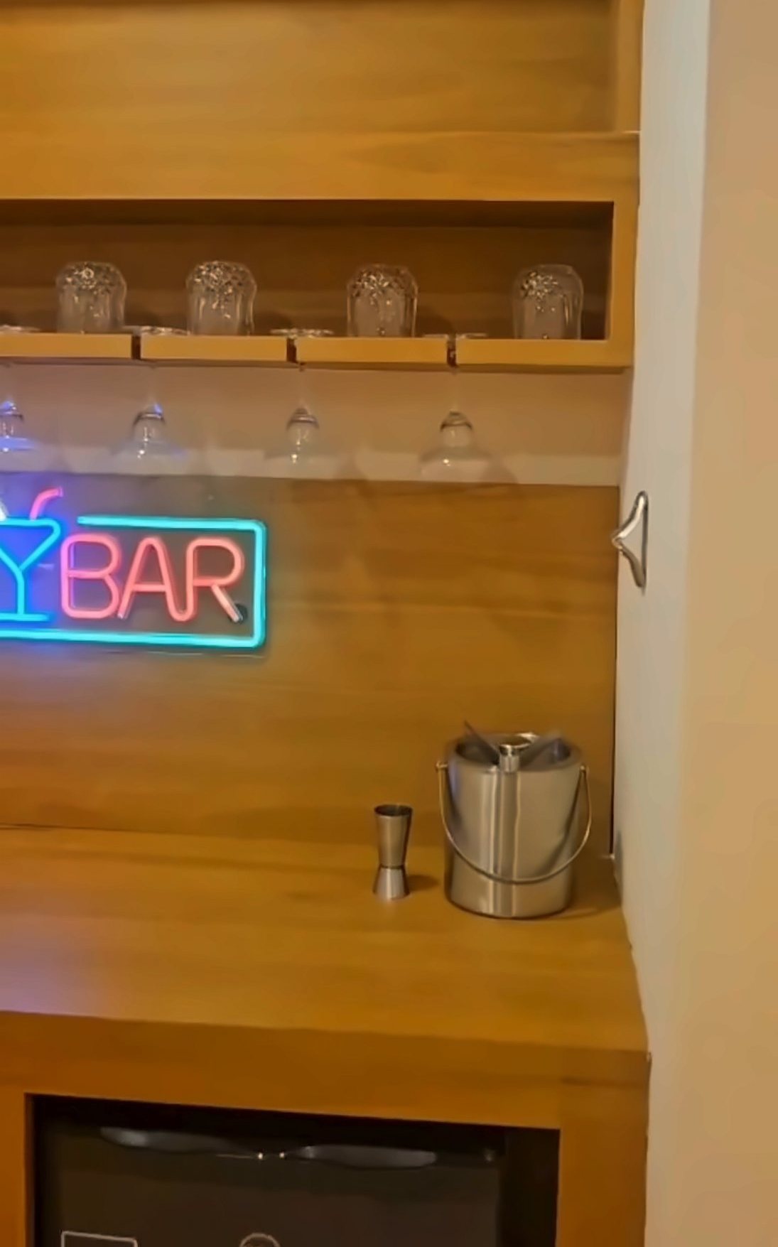 Bar room option — the Party Suite bar counter with neon BAR sign