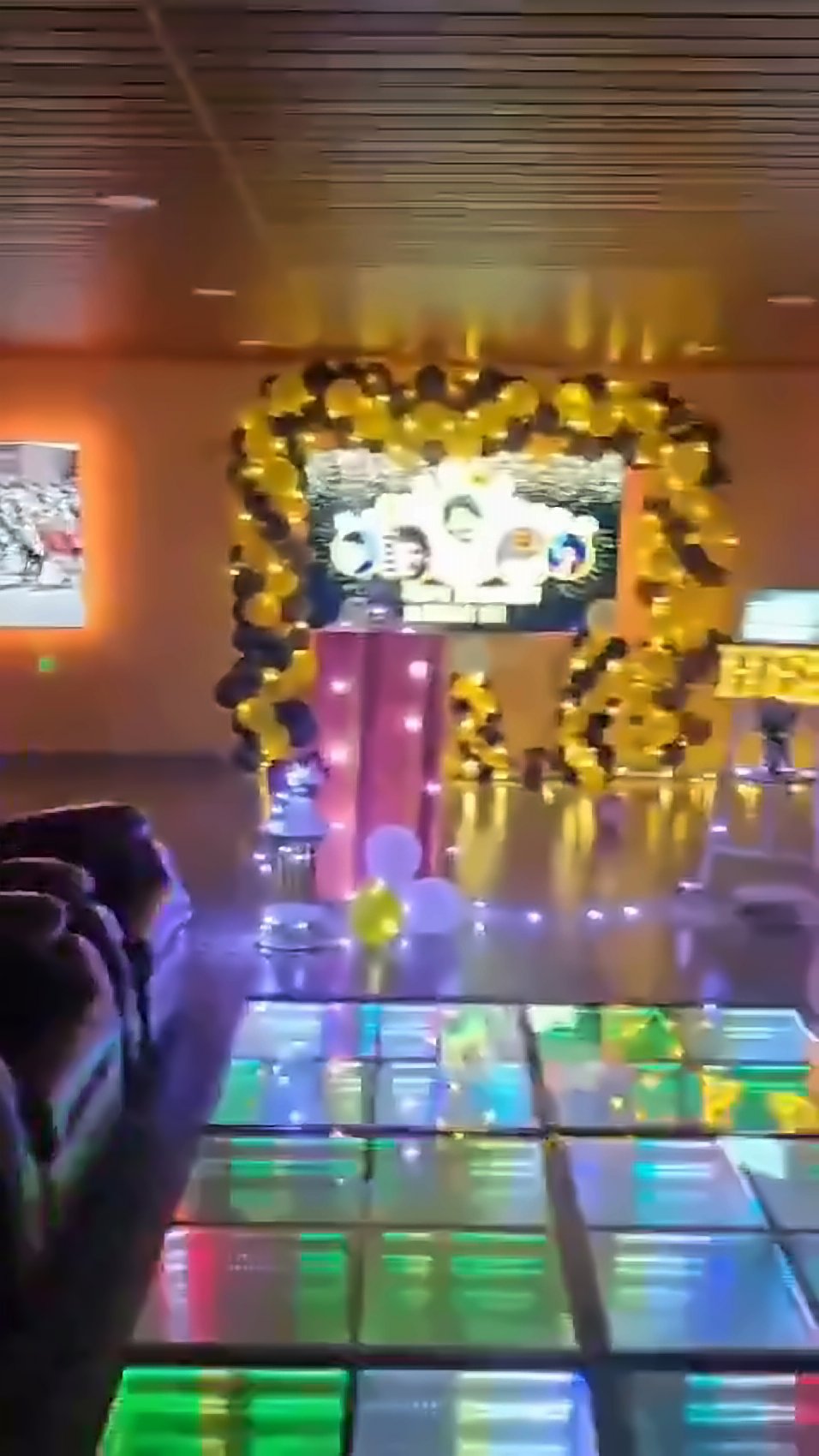 Colour-changing LED dance floor lit up for a party